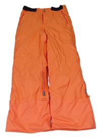 Oranžové funkční šusťákové oteplovačky Decathlon