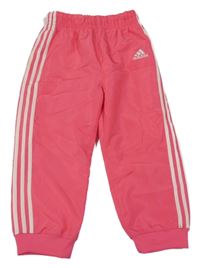 Jahodovo-bílé šusťákové sportovní kalhoty Adidas
