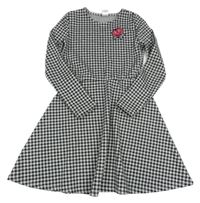 Černo-bílé kostkované šaty s růží C&A