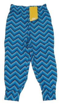 Nové - modro-petrolejovo-tmavomodro-bílé vzorované cuff lehké kalhoty Kids