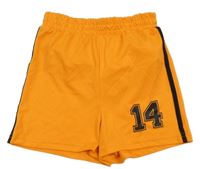 Oranžové sportovní kraťasy s číslem 