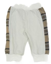 Bílé tepláky s hnědým kostkovaným pruhem 