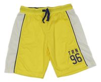 Žluto-bílé sportovní kraťasy s číslem Terranova