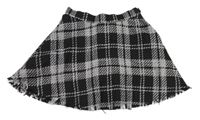 Černo-bílá kostkovaná sukně s všitými kraťasy H&M