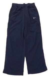 Tmavomodré tepláky s logem Nike