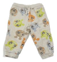 Béžové tepláky s příšerkami So Cute