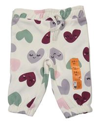 Nové - Smetanové tepláky se srdíčky Primark